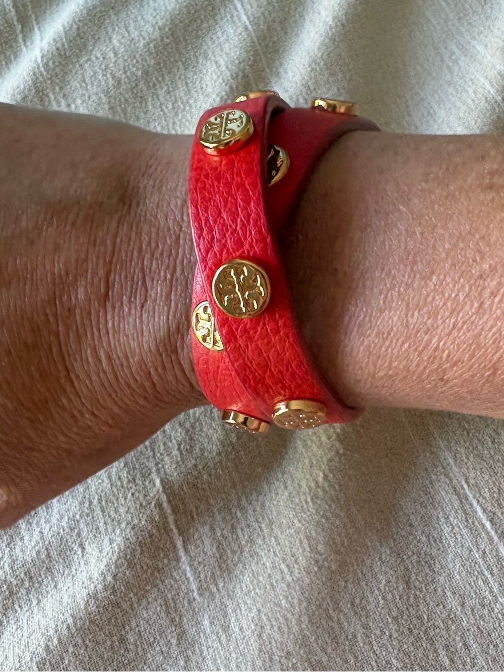 Tory Burch double wrap leather bracelet with gold studs orange red